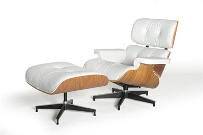 Lot 1545 - A Modern 670 Lounge Chair and Ottoman, designed by Charles and Ray Eames, with white leather...