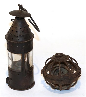 Lot 155 - Two iron lamps