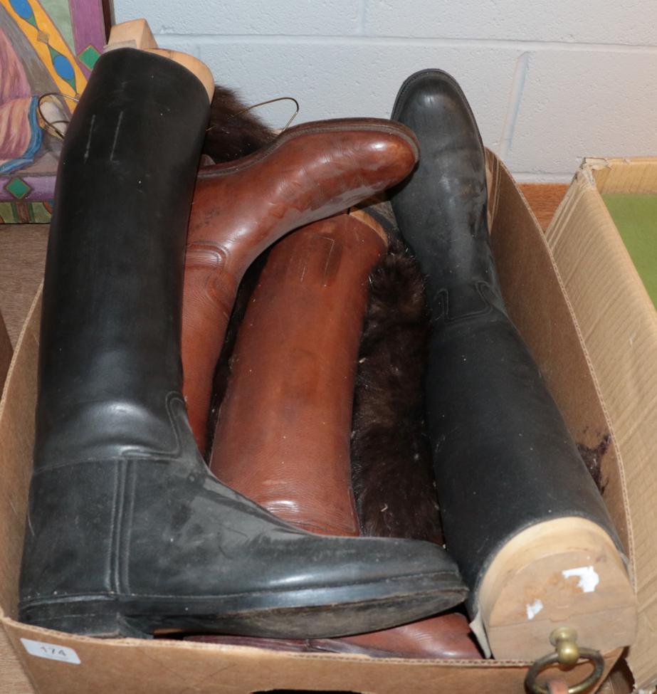 Lot 174 - Two pairs of leather riding boots with boot trees; and a group of fur