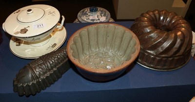 Lot 211 - A 19th century Creamware ecuelle; and three moulds (4)