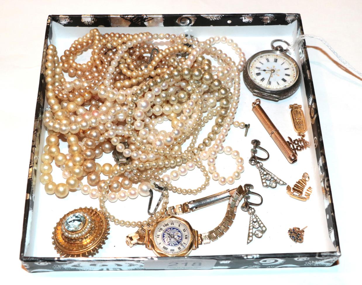 Lot 218 - A lady's 18 carat gold wristwatch; a Victorian brooch, unmarked; a single earring, stamped '375'; a
