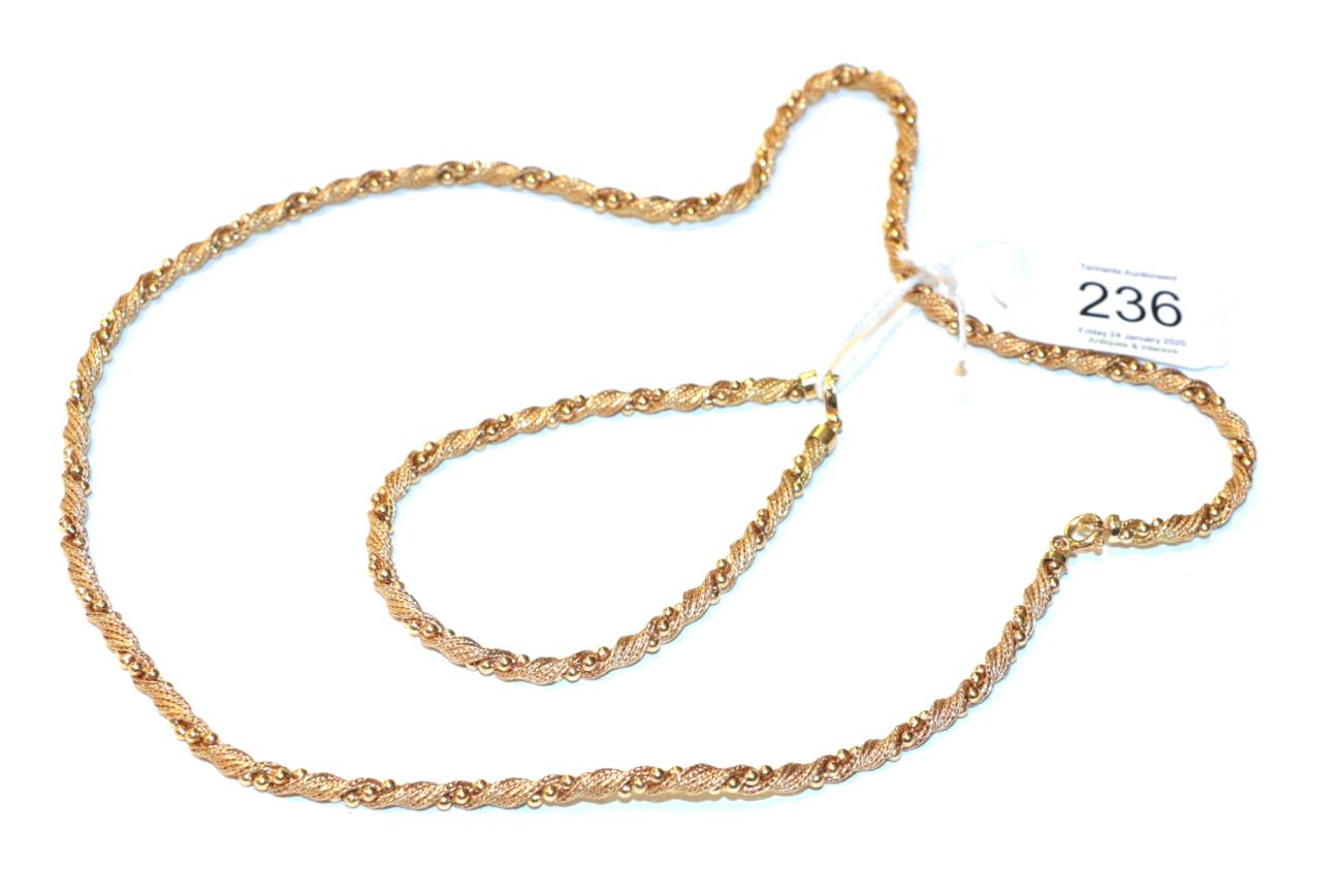 Lot 245 - A fancy link necklace, stamped '750', length 56cm; and a matching bracelet, stamped '750',...