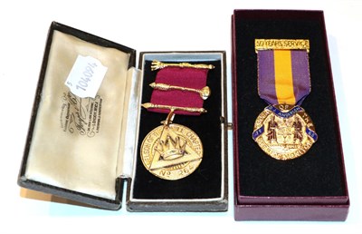 Lot 247 - A swagger stick; a shooting stick; and two cased Masonic medals (4)