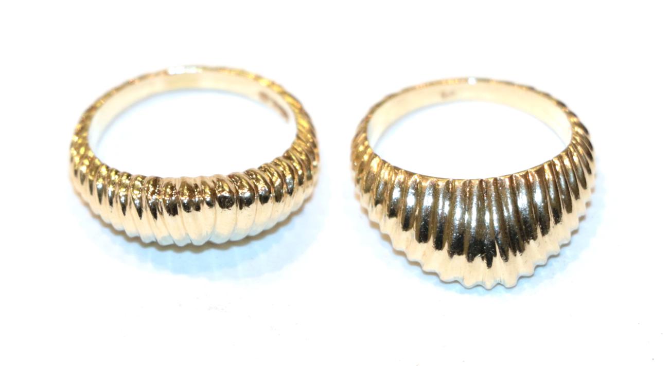 Lot 251 - Two fancy scalloped band rings, unmarked, finger size I