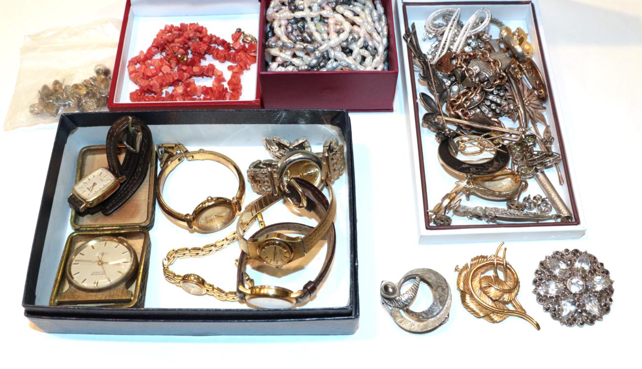Lot 265 - A quantity of costume jewellery including brooches, a coral necklace, wristwatches, earrings etc