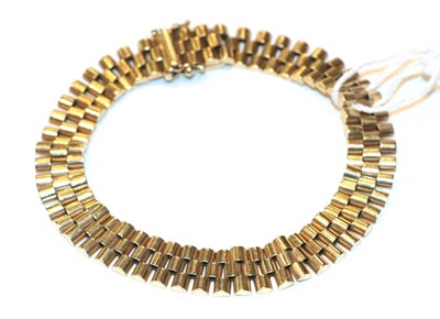 Lot 268 - A 9 carat gold brick link bracelet, length 20cm