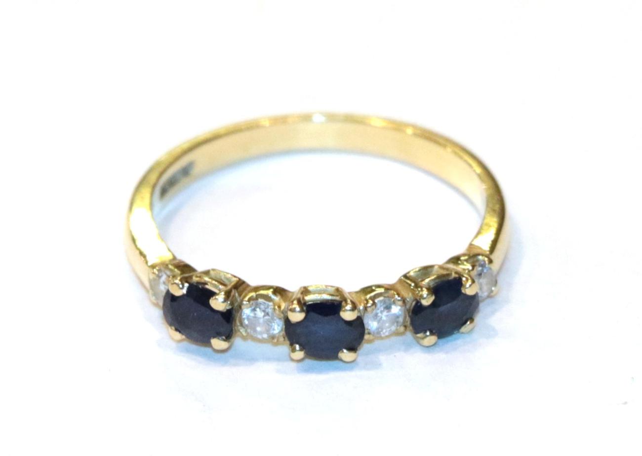 Lot 270 - An 18 carat gold sapphire and diamond ring, finger size N