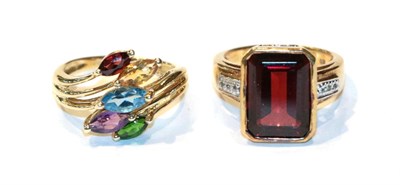 Lot 272 - A 9 carat gold garnet, citrine, blue topaz, amethyst and tsavorite garnet ring, finger size N;...