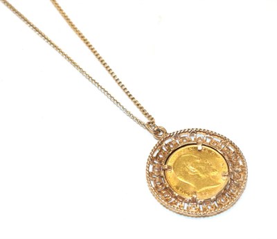 Lot 276 - A 1910 full sovereign loose mounted as a pendant on chain, pendant length 4.3cm, chain length...