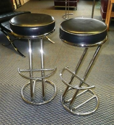 Lot 1558 - A Set of Six Chrome and Black Upholstered High Stools, with semi-circular foot rests, on...