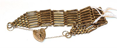 Lot 283 - A 9 carat gold gate bracelet, length 20cm