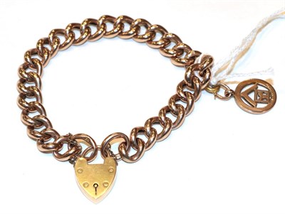 Lot 285 - A curb and lock bracelet, length 22cm; and a 9 carat gold Masonic fob