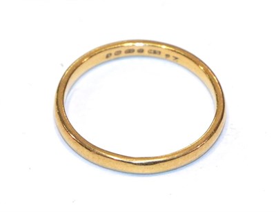 Lot 297 - A 22 carat gold band ring, finger size P