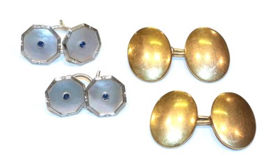 Lot 300 - A pair of oval cufflinks, each stamped '9' and '.375'; and a pair of mother of pearl and...