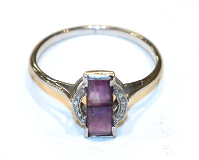 Lot 303 - An Art Deco amethyst and diamond ring, finger size O1/2  NB: one diamond deficient