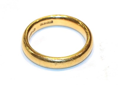 Lot 307 - A 22 carat gold band ring, finger size O