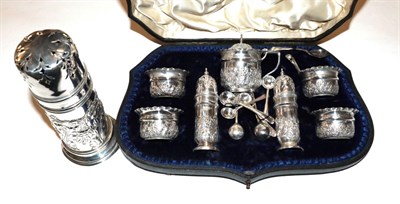 Lot 349 - A cased Edward VII silver condiment-set, by Vale Brothers and Sermon, Chester, 1905 1906, each...