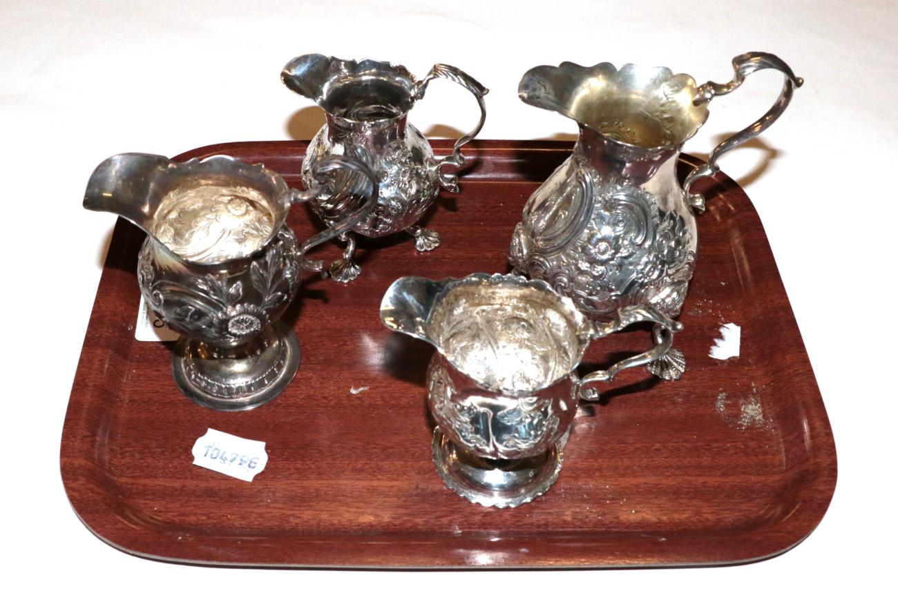 Lot 356 - Three George II and George III silver cream-jugs and a Victorian silver cream-jug, the first...