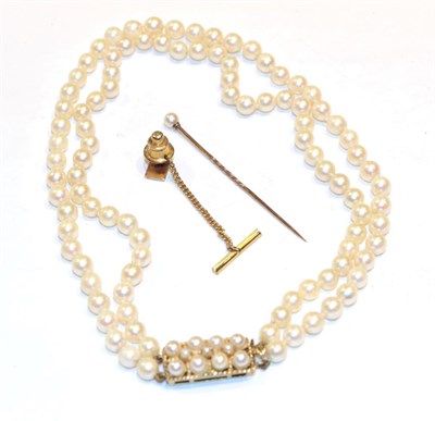 Lot 368 - A double row cultured pearl necklace, clasp stamped '9CT'; a tie stud; and a cutlured pearl...