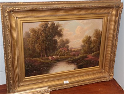 Lot 447 - E Horlor (19th/20th century) Cows watering before a country cottage, signed oil on canvas