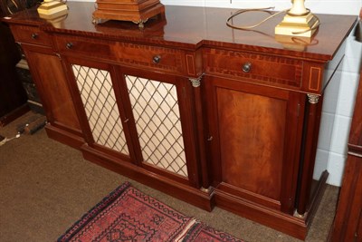 Lot 463 - A reproduction mahogany and crossbanded credenza with metal grille doors, 195cm wide