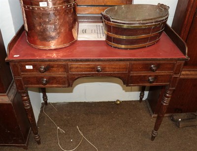 Lot 474 - A mid 19th century oak dressing table with raised gallery and turned tapering legs