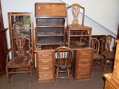 Lot 477 - An Edwardian oak tambour fronted desk; together with three Chippendale style oak dining chairs; two