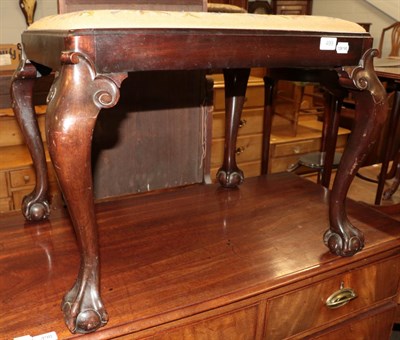 Lot 499 - A 1920s stool with claw and ball feet