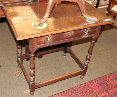 Lot 502 - An 18th century oak side table with single drawer