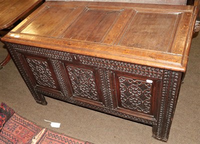 Lot 517 - A 17th century oak coffer initialled 'M.B 1684', 72cm high by 116cm wide