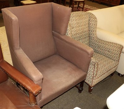 Lot 524 - A George III style wing armchair; together with an Edwardian armchair (2)