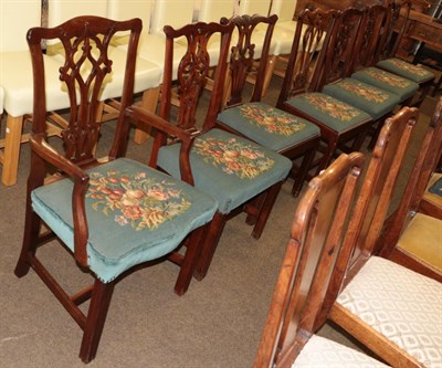 Lot 527 - A harlequin set of seven mahogany Chippendale style dining chairs, with carved backs, raised on...