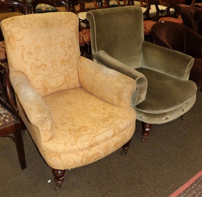 Lot 531 - Two Victorian armchairs raised on turned legs with castors