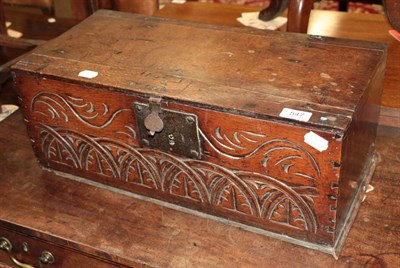 Lot 547 - A 17th century carved oak table box with hinged lid, 55cm wide