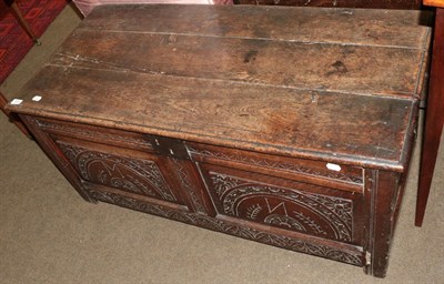 Lot 553 - An early 18th century oak coffer carved with the initials M.N