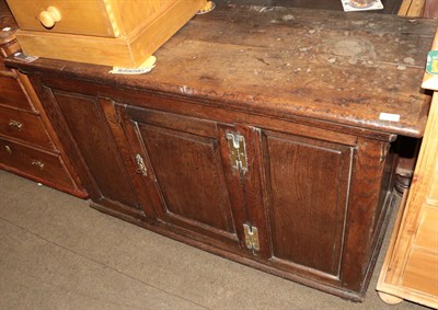 Lot 564 - An 18th century oak panelled cupboard, 128cm wide