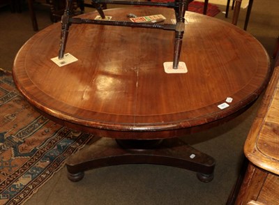 Lot 567 - A Victorian mahogany and circular crossbanded breakfast table