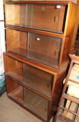 Lot 575 - A 20th century Simplex sectional bookcase with glazed doors