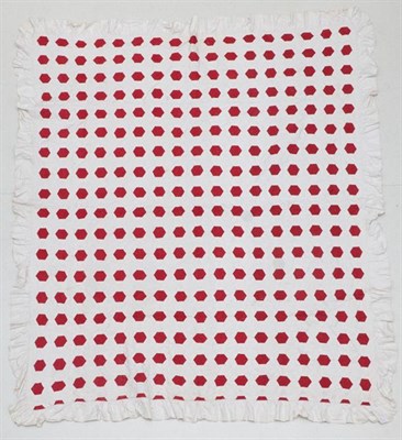 Lot 2001 - A Late 19th Century Turkey Red and White Cotton Hexagonal Quilt, quilted in circular leaf...