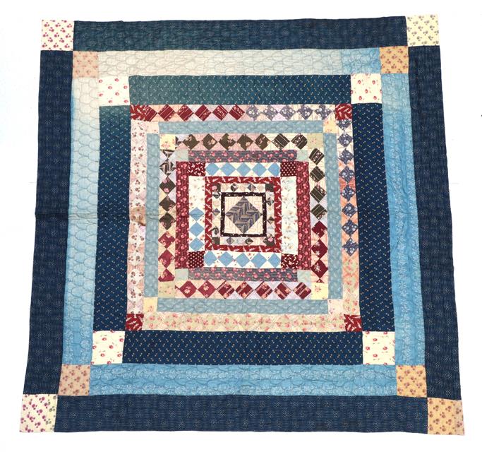 Lot 2002 - A Large Late 19th Century Quilt, worked in frames and diamonds with blocked corners,...