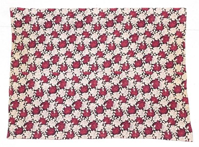 Lot 2006 - An Early 20th Century Reversible Wholecloth Quilt, printed with large maroon printed rose heads...