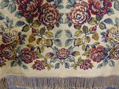 Lot 2015 - A Late Victorian Chenille Table Rug, decorated overall with rust coloured flower heads on a...