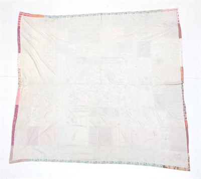 Lot 2020 - A 19th Century Printed Cotton Patchwork Bed Cover, with central square of pink roses and...