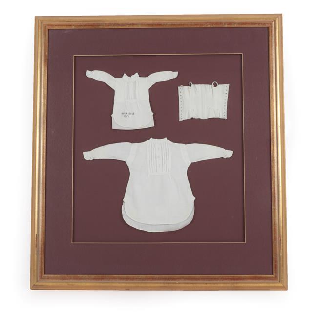 Lot 2023 - A Framed Display of Three 19th Century School Sewing Samples, including a white cotton corset...