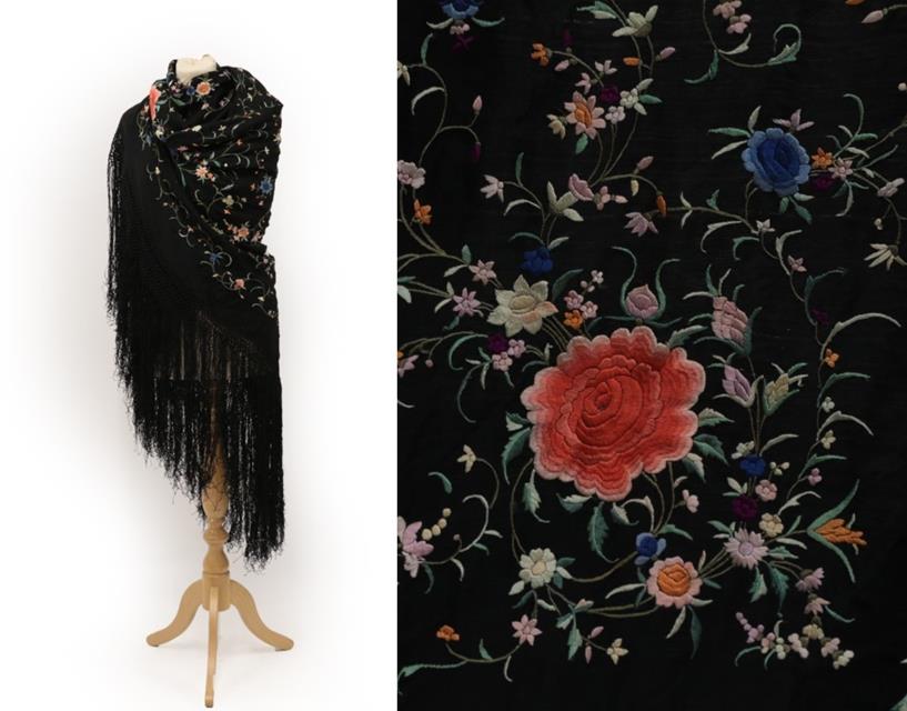 Lot 2039 - An Early 20th Century Chinese Black Silk Shawl, embroidered to the centre with four coral...