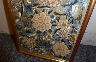 Lot 2041 - An Early 20th Century Chinese Embroidered Panel, depicting butterflies amongst blue...