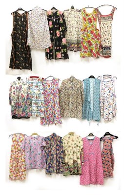 Lot 2079 - Eighteen Assorted Circa 1930's-1950's Printed Cotton Aprons and Housecoats, including a...