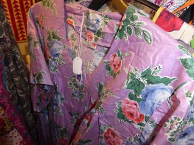 Lot 2079 - Eighteen Assorted Circa 1930's-1950's Printed Cotton Aprons and Housecoats, including a...