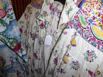 Lot 2079 - Eighteen Assorted Circa 1930's-1950's Printed Cotton Aprons and Housecoats, including a...