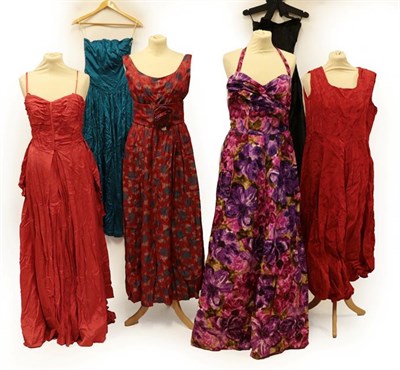 Lot 2084 - Six Circa 1950's Evening Dresses, comprising a Susan Small Model black silk taffeta halter neck...